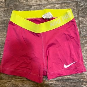 Pink Nike Pro spandex shorts